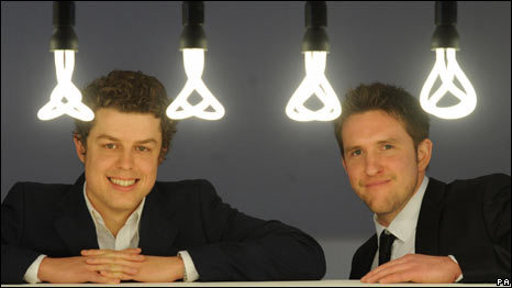 Samuel Wilkinson (right) and Michael-George Hemus below a selection of low-energy Plumen 001 light bulbs, which are lit up 