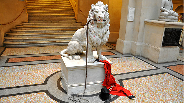Art installation 'Lion tamer tamed' by Banksy