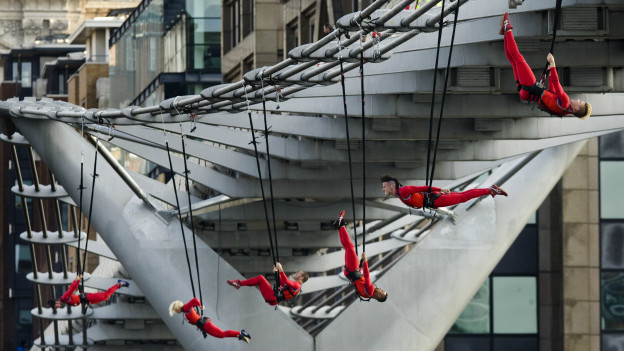 Extreme dancers hang from London's Millennium Bridge as part of the London 2012 Olympic Festival. 