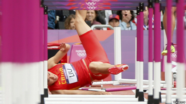 China's Liu Xiang falls at the first barrier in the men's 110m hurdles. 