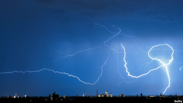 A thunderbolt lights up the sky above the city of Munich, Germany. 