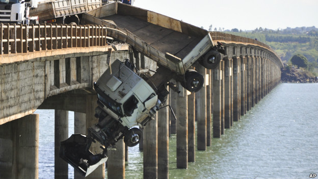 A truck hangs from the Chavantes bridge near Fartuna, Brazil. 