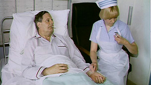 a nurse checking a patient's pulse, BBC image