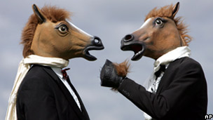 People in horse masks