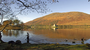 a man fishing in a lake