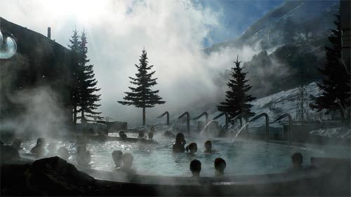 Hot springs is surrounded by snow-capped mountains