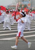 图文-北京奥运圣火在开封传递 激情豪迈向前进