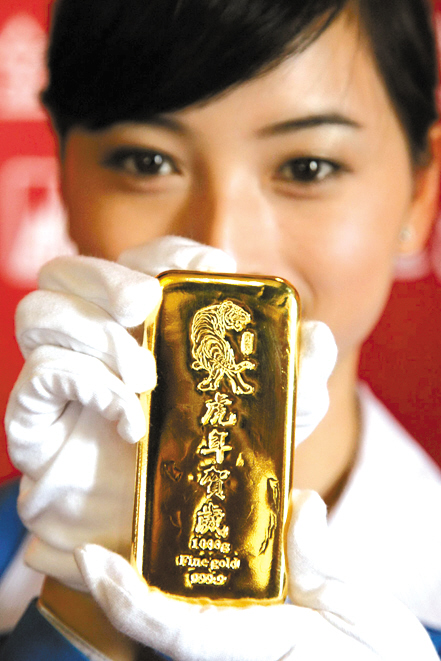 孙晶 通 讯 员 戴崇业 时下的投资黄金热昨日在广州的贺岁金条
