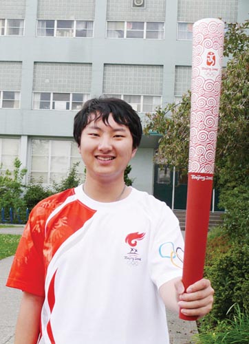 北京奥运会火炬手杨尚文今年刚满17岁,就读于温市churchill 中学