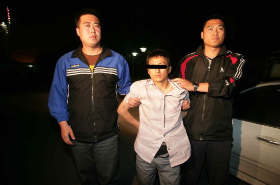 5月11日,北京市警方抓获犯罪嫌疑人新华社发(张岩摄)