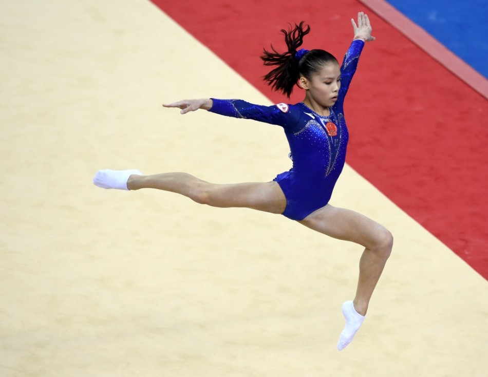 体操全锦赛商春松再揽两金