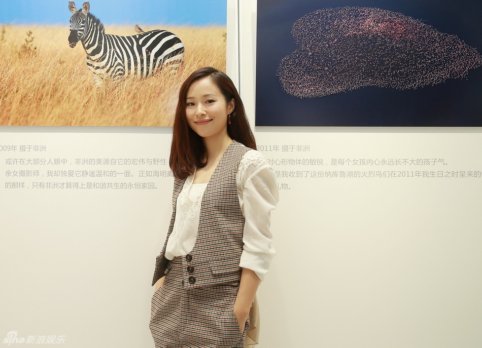 江一燕办公益摄影展作品入选国家地理