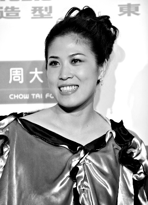 高崚曾两夺奥运会羽毛球混双冠军