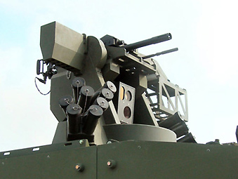 台军展示自制新型车载榴弹机枪遥控枪塔