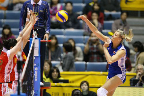 图文女排世锦赛中国vs波兰薛明与队友拦格林卡