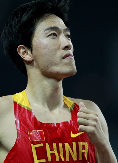 图文-亚运110米栏小组赛刘翔轻松晋级 犀利眼神